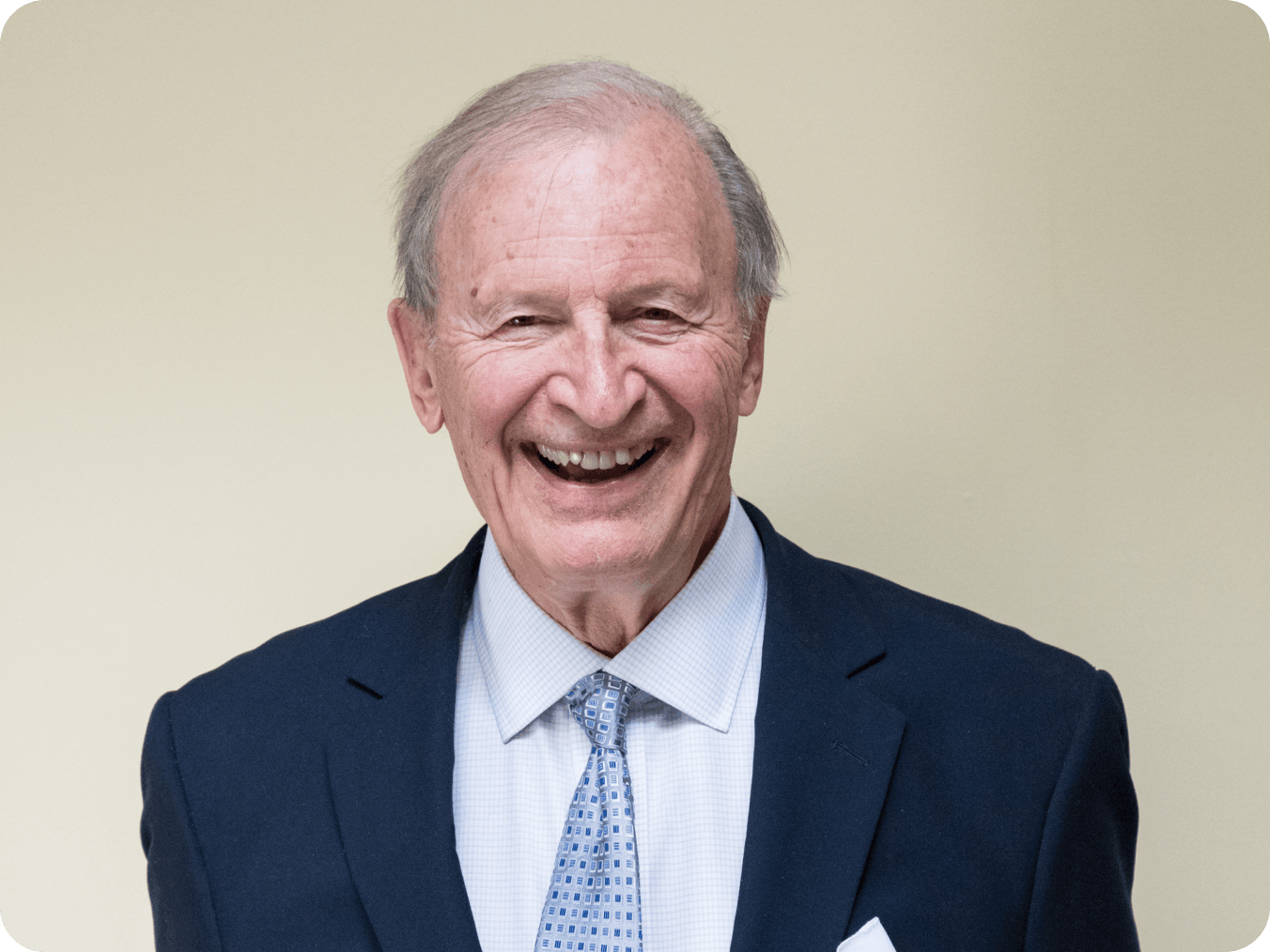 Portrait souriant de Pierre Arbour, fondateur de la Fondation Arbour
